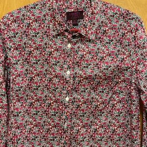 Womens floral blouse in shades of magenta, violet, cream and green